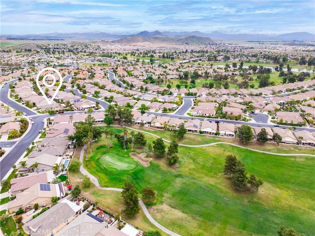 bird's eye view with a residential view, a mountain view, and golf course view