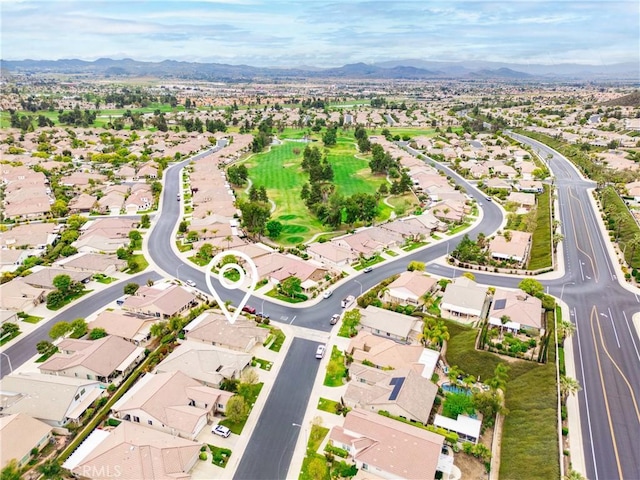 birds eye view of property featuring a residential view and a mountain view
