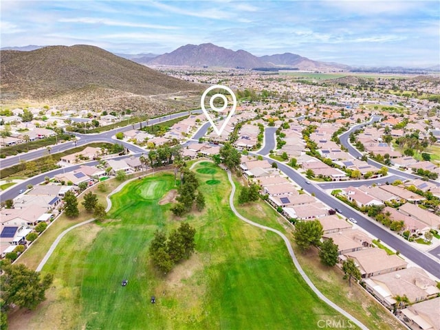 bird's eye view with a residential view, a mountain view, and golf course view