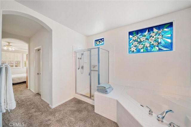 bathroom with connected bathroom, carpet, baseboards, a shower stall, and a garden tub