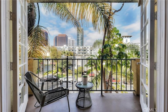 balcony featuring a view of city