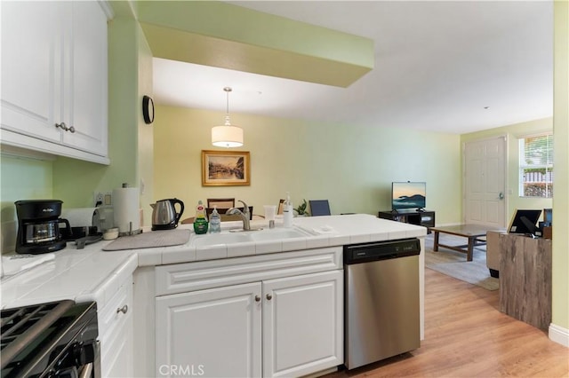 13435 Cascade Ct, Cerritos, CA 90703 - kitchen with a peninsula, a sink, open floor plan, stainless steel dishwasher, and range
