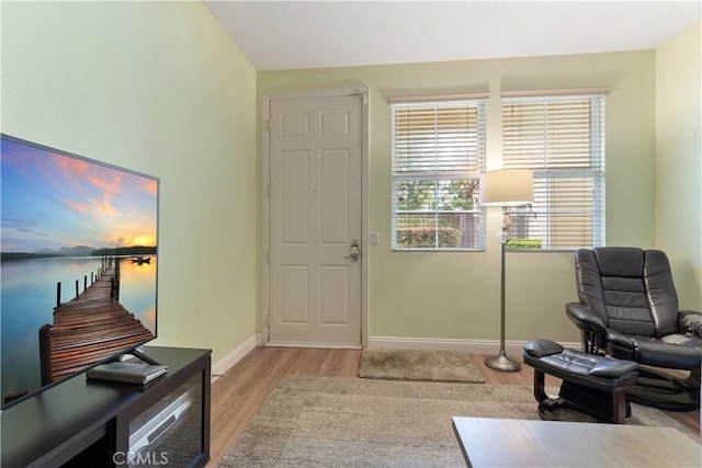 13435 Cascade Ct, Cerritos, CA 90703 - sitting room with light wood finished floors and baseboards