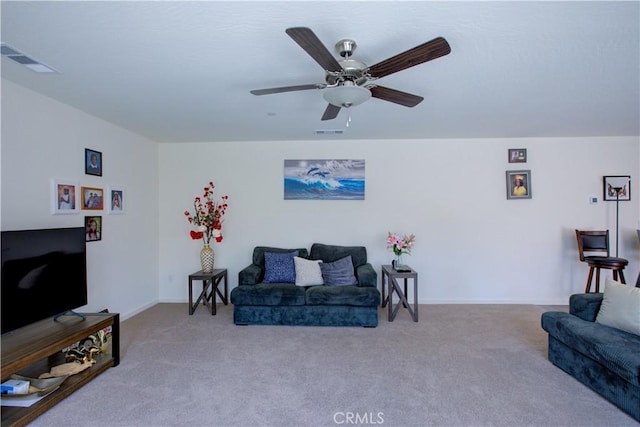 218 Bryce Canyon Ct, Merced, CA 95341 - living room featuring carpet, a ceiling fan, and baseboards