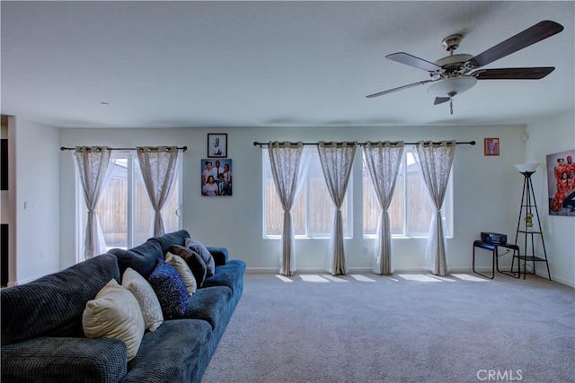 218 Bryce Canyon Ct, Merced, CA 95341 - living room with baseboards, carpet floors, and ceiling fan