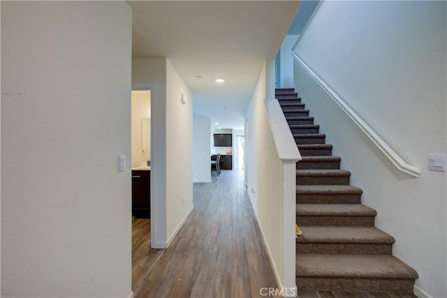 218 Bryce Canyon Ct, Merced, CA 95341 - stairs featuring wood finished floors, baseboards, and recessed lighting