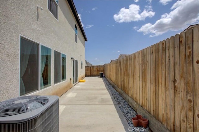 218 Bryce Canyon Ct, Merced, CA 95341 - view of patio / terrace featuring central AC and a fenced backyard