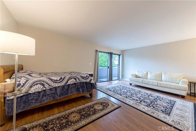 10982 Roebling Ave Unit 367, Los Angeles, CA 90024 - bedroom featuring access to outside and wood finished floors