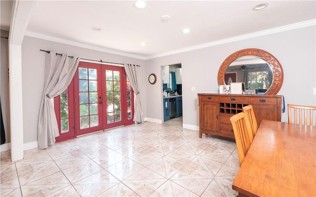 dining room featuring baseboards, ornamental molding, french doors, and recessed lighting