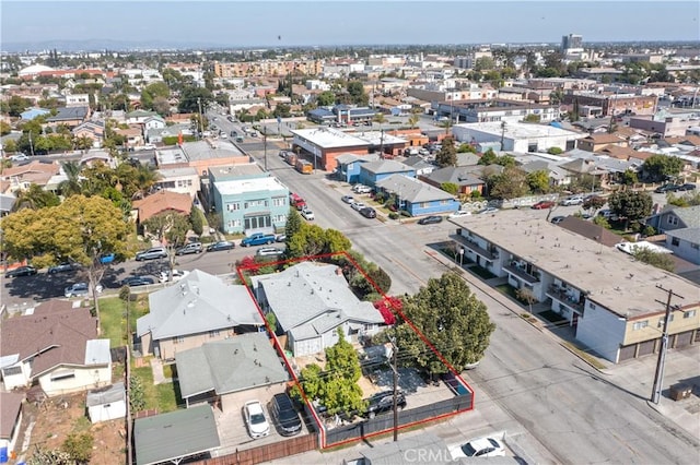 birds eye view of property with a residential view
