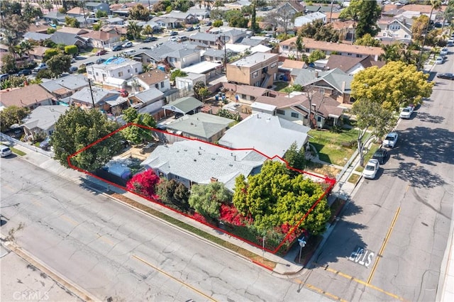 birds eye view of property with a residential view