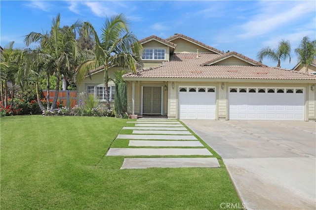 view of front of home with concrete driveway, a front yard, a tiled roof, and a garage