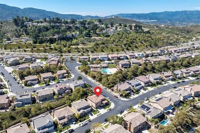 bird's eye view with a residential view and a mountain view