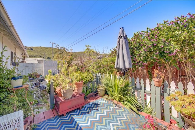 view of patio with fence