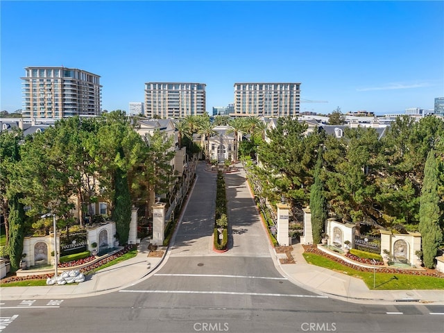 birds eye view of property featuring a city view