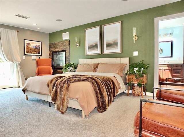 carpeted bedroom with baseboards, recessed lighting, and visible vents