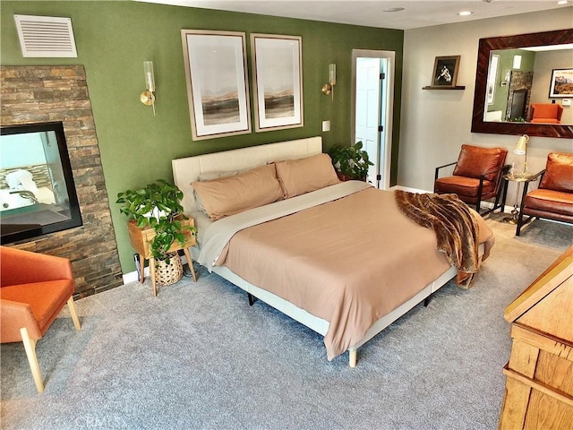 carpeted bedroom with visible vents, recessed lighting, and baseboards