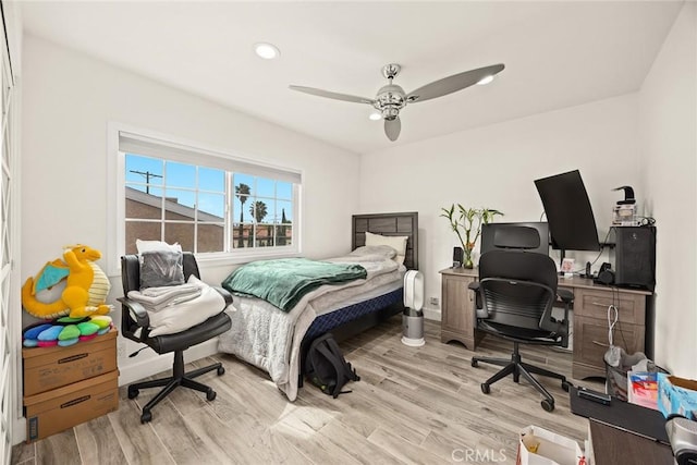 bedroom featuring recessed lighting, ceiling fan, baseboards, and light wood-style floors