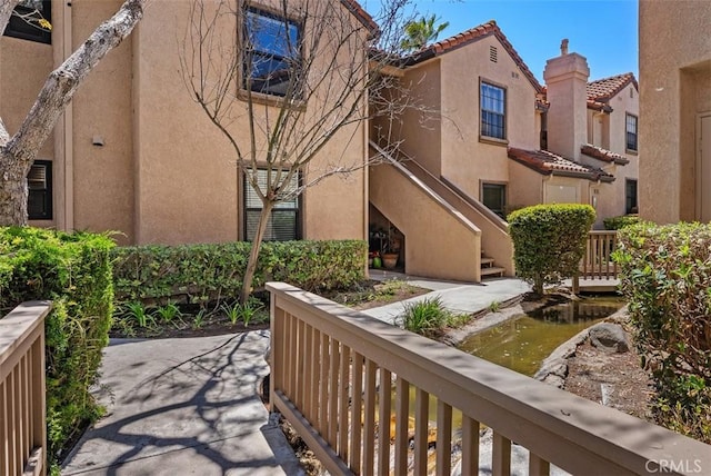 surrounding community featuring stairs