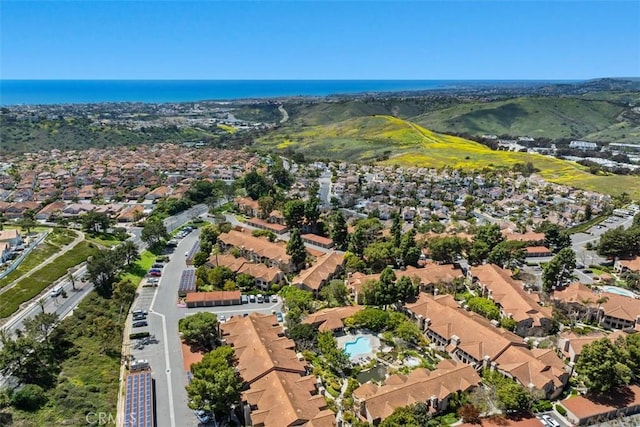 aerial view with a residential view and a water view