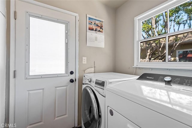 laundry room featuring laundry area and washing machine and dryer