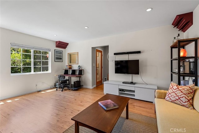 17557 Gilmore St, Lake Balboa, CA 91406 - living area with wood finished floors, baseboards, recessed lighting, and a desk