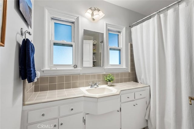 17557 Gilmore St, Lake Balboa, CA 91406 - bathroom featuring vanity, tasteful backsplash, and a shower with shower curtain