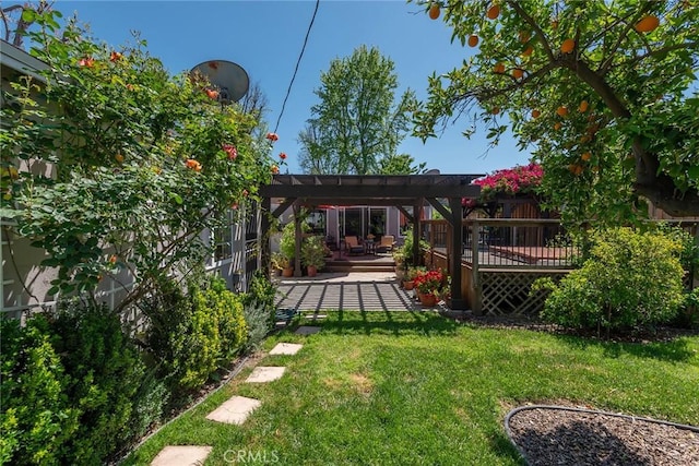 17557 Gilmore St, Lake Balboa, CA 91406 - rear view of property featuring a pergola, a yard, a wooden deck, and a patio