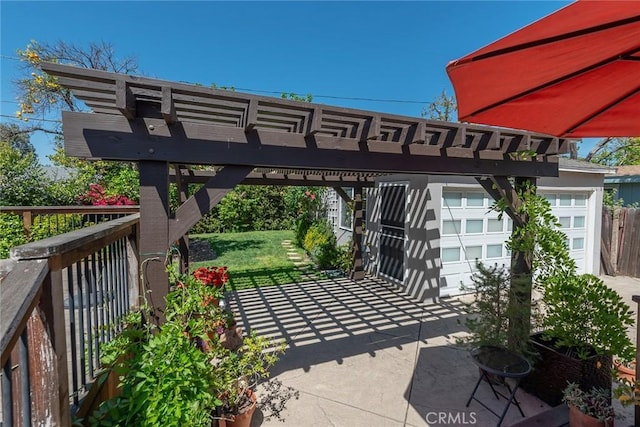 17557 Gilmore St, Lake Balboa, CA 91406 - view of patio with a pergola and a garage