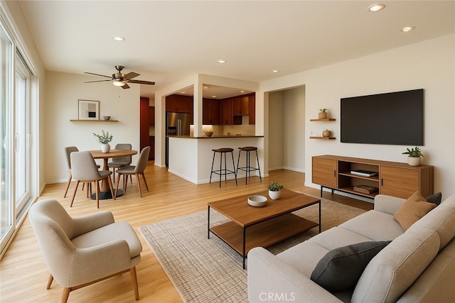 17557 Gilmore St, Lake Balboa, CA 91406 - living room featuring ceiling fan, recessed lighting, light wood finished floors, and baseboards
