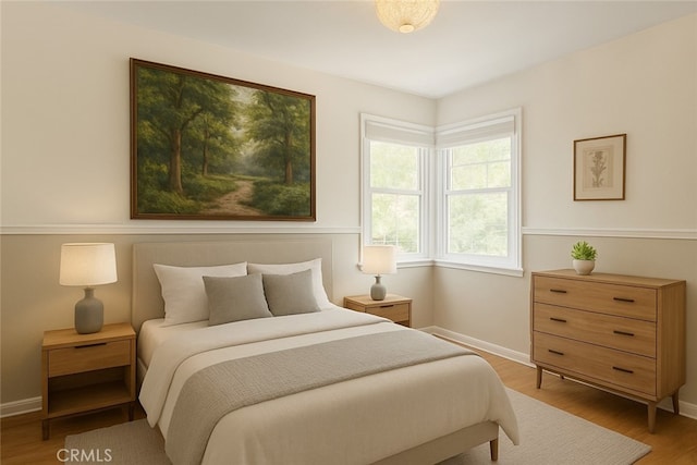 17557 Gilmore St, Lake Balboa, CA 91406 - bedroom with light wood-style floors and baseboards
