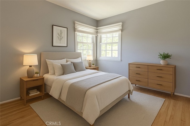 17557 Gilmore St, Lake Balboa, CA 91406 - bedroom featuring baseboards and light wood-style floors