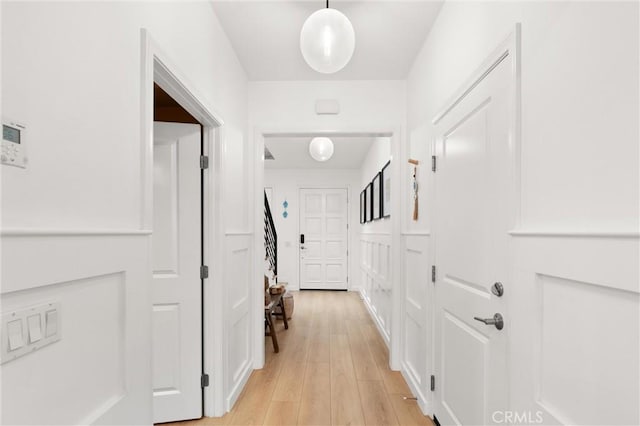 112 Gemstone, Irvine, CA 92620 - corridor featuring light wood finished floors