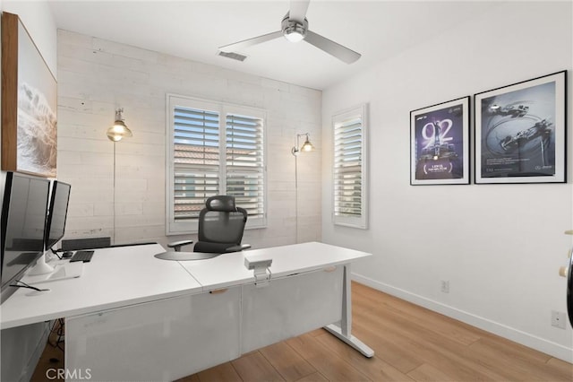 112 Gemstone, Irvine, CA 92620 - home office with baseboards, a ceiling fan, light wood finished floors, and visible vents