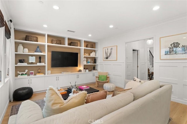 112 Gemstone, Irvine, CA 92620 - living area with visible vents, stairs, light wood-style floors, ornamental molding, and recessed lighting