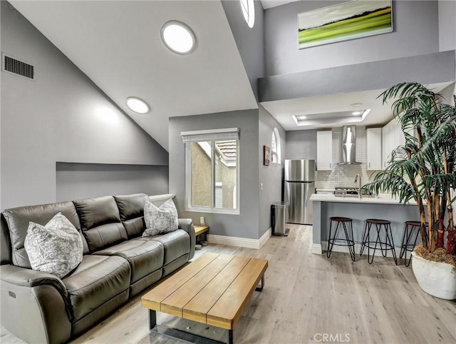 25081 Leucadia St Unit F, Laguna Niguel, CA 92677 - living area with light wood-type flooring and baseboards