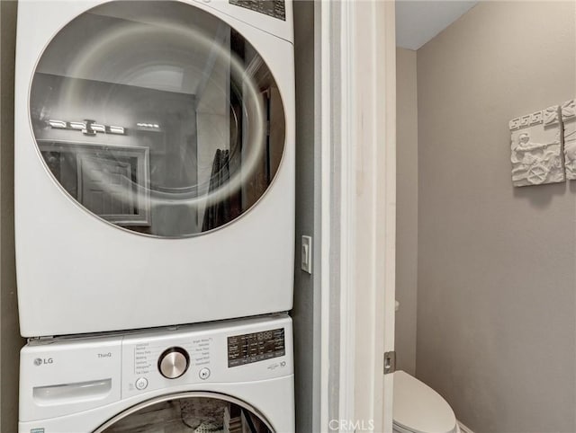 25081 Leucadia St Unit F, Laguna Niguel, CA 92677 - washroom with stacked washer and clothes dryer