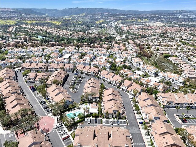 25081 Leucadia St Unit F, Laguna Niguel, CA 92677 - aerial view of property and surrounding area with a mountain backdrop and nearby suburban area