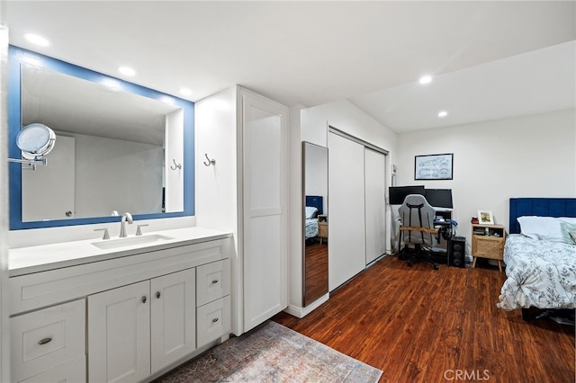 985 S Idaho St Unit 46, La Habra, CA 90631 - bedroom featuring a sink, dark wood finished floors, a closet, recessed lighting, and a desk