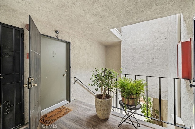 985 S Idaho St Unit 46, La Habra, CA 90631 - property entrance featuring stucco siding and a balcony
