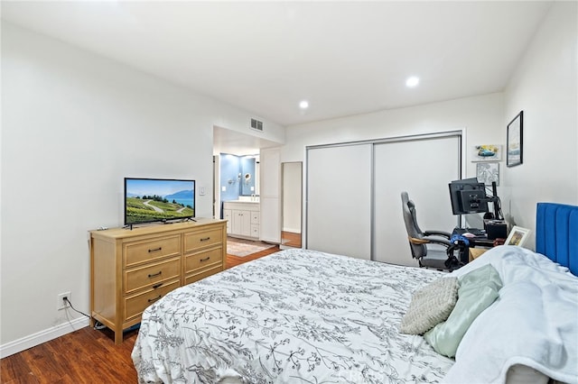 985 S Idaho St Unit 46, La Habra, CA 90631 - bedroom with dark wood-style floors, a closet, baseboards, recessed lighting, and ensuite bath