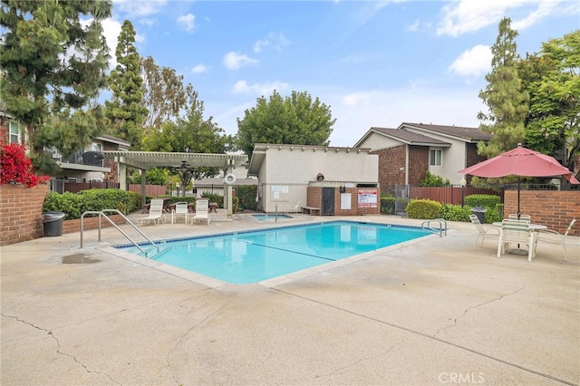 985 S Idaho St Unit 46, La Habra, CA 90631 - community pool with a pergola and a patio area