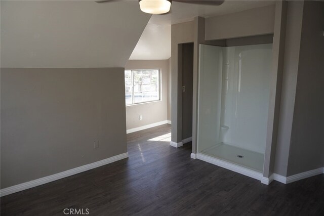 2404 E California, Bakersfield, CA 93307 - full bathroom with a ceiling fan, wood finished floors, walk in shower, baseboards, and lofted ceiling