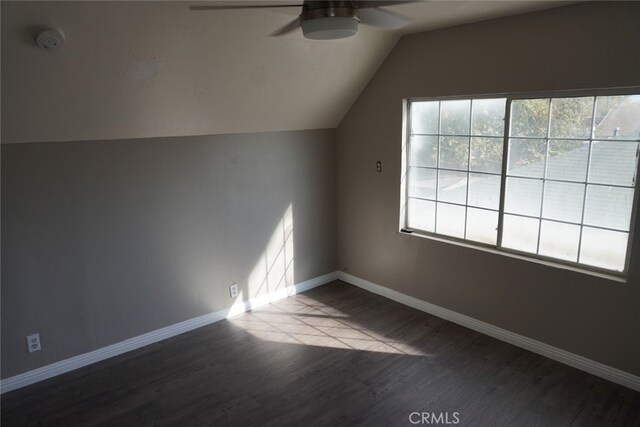 2404 E California, Bakersfield, CA 93307 - bonus room with ceiling fan, dark wood-style flooring, vaulted ceiling, and baseboards