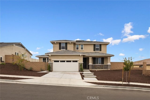 31768 Constellation Dr, Menifee, CA 92586 - view of front facade with stucco siding, an attached garage, fence, driveway, and stone siding