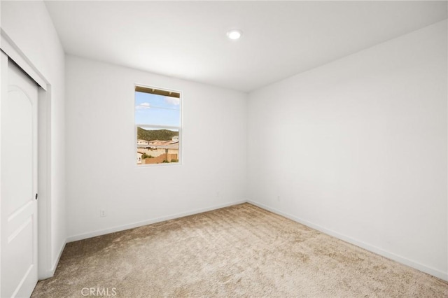 31768 Constellation Dr, Menifee, CA 92586 - unfurnished bedroom featuring carpet flooring, baseboards, a closet, and recessed lighting