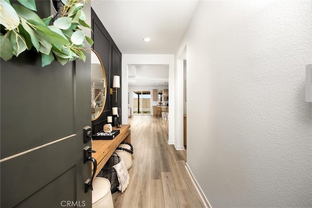 31768 Constellation Dr, Menifee, CA 92586 - hallway featuring light wood-style flooring, baseboards, and recessed lighting