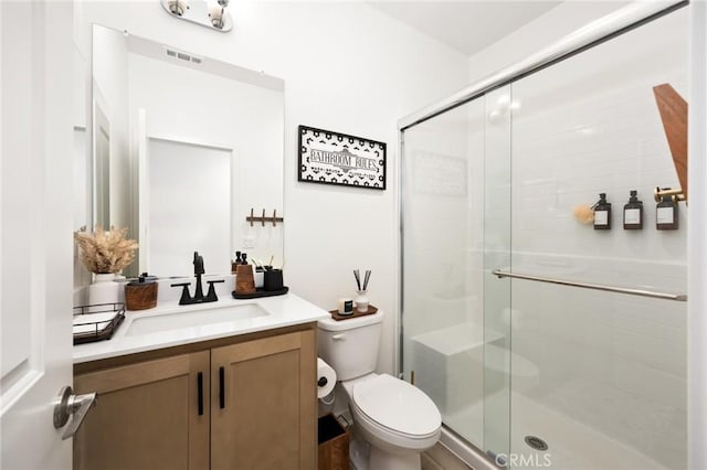 31768 Constellation Dr, Menifee, CA 92586 - full bathroom featuring toilet, a stall shower, and vanity