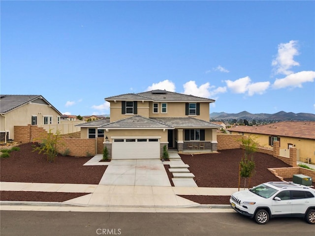31768 Constellation Dr, Menifee, CA 92586 - view of front of home featuring a porch, stucco siding, fence, a garage, and driveway