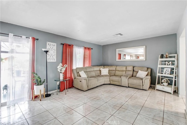 10005 Elwood Ave, Fontana, CA 92335 - living area featuring visible vents and light tile patterned flooring